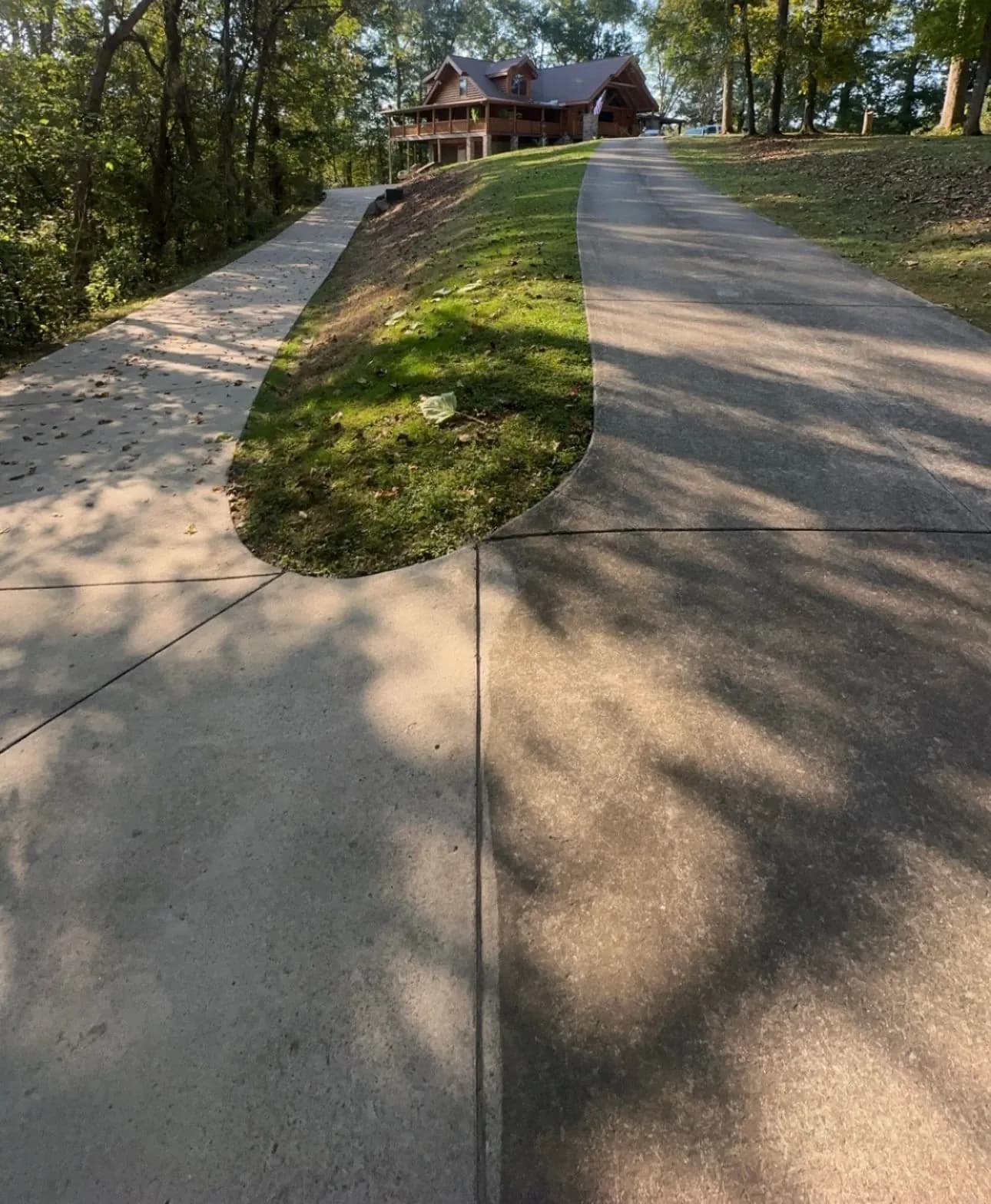 The finished driveway running clean to the house