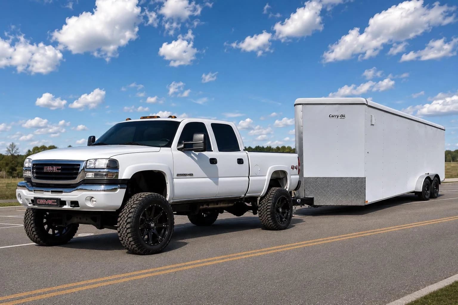 Traukie's Services truck towing a large enclosed moving trailer